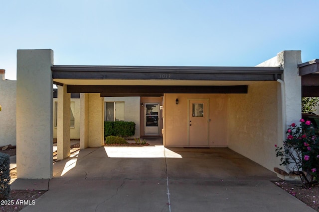 exterior space featuring a carport