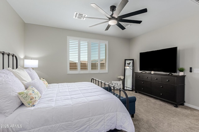 bedroom with ceiling fan and light colored carpet