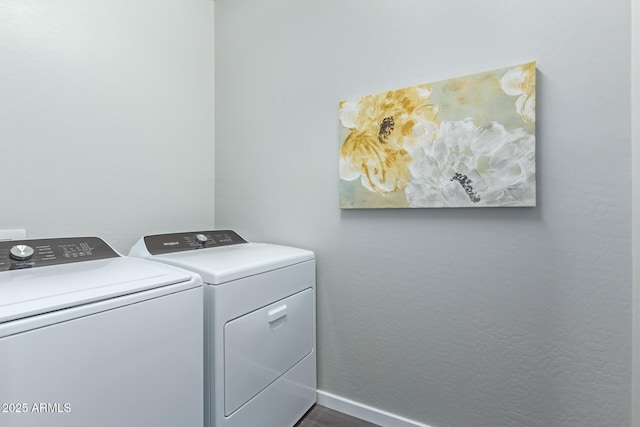 laundry room featuring separate washer and dryer