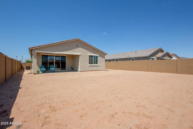 back of house featuring a patio