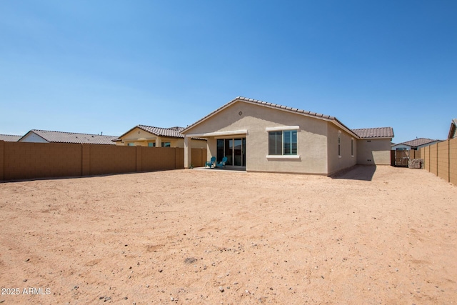 rear view of property with a patio area