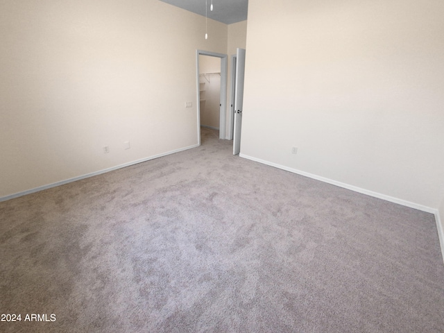 unfurnished room with carpet floors