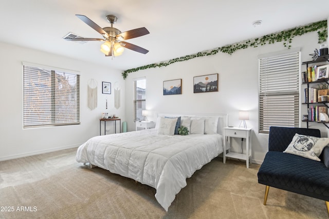 bedroom with ceiling fan and carpet