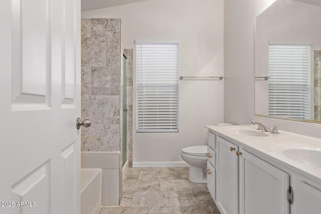 full bathroom featuring vanity, toilet, and independent shower and bath