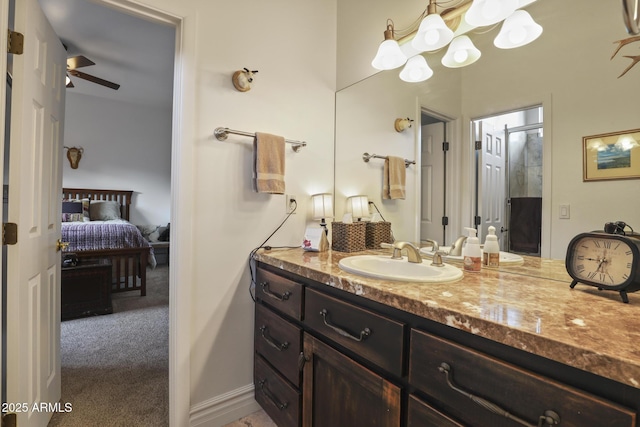4562 N Dream Catcher Way, Pine, AZ 85544 - full bathroom with vanity, ensuite bathroom, a ceiling fan, and a chandelier