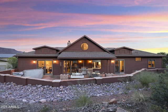 4562 N Dream Catcher Way, Pine, AZ 85544 - back of property featuring a patio area and roof with shingles