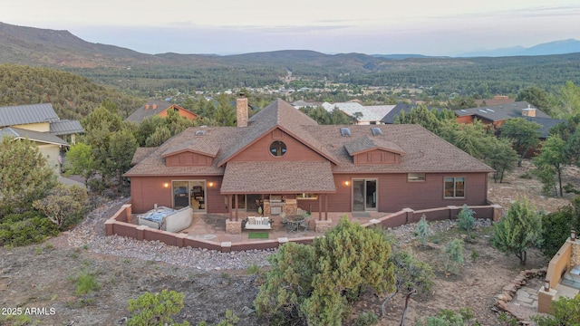 4562 N Dream Catcher Way, Pine, AZ 85544 - aerial view of property and surrounding area with a mountain backdrop and a forest