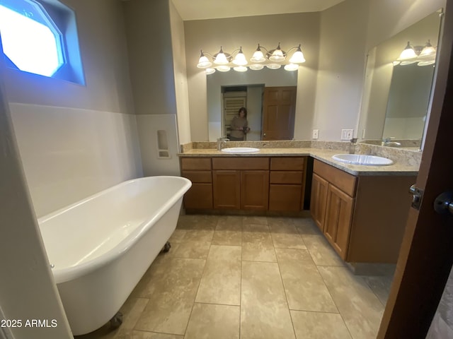19322 E Calle De Flores, Queen Creek, AZ 85142 - full bath featuring a sink, double vanity, tile patterned floors, and a freestanding tub