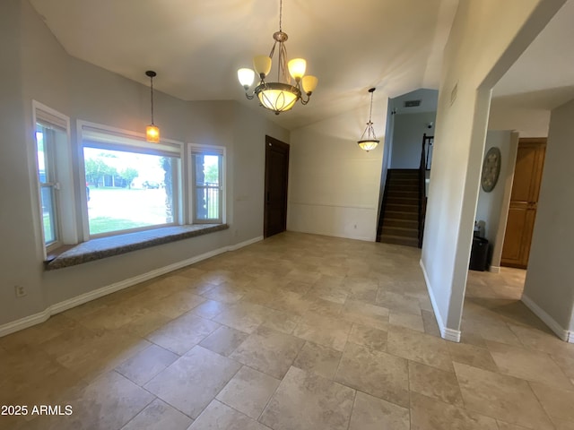 19322 E Calle De Flores, Queen Creek, AZ 85142 - unfurnished dining area featuring lofted ceiling, stairs, stone finish flooring, a notable chandelier, and baseboards