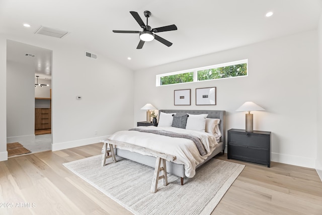 bedroom featuring recessed lighting, light wood-type flooring, visible vents, and baseboards