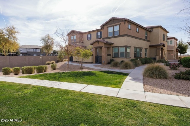 view of front of house with central AC and a front yard