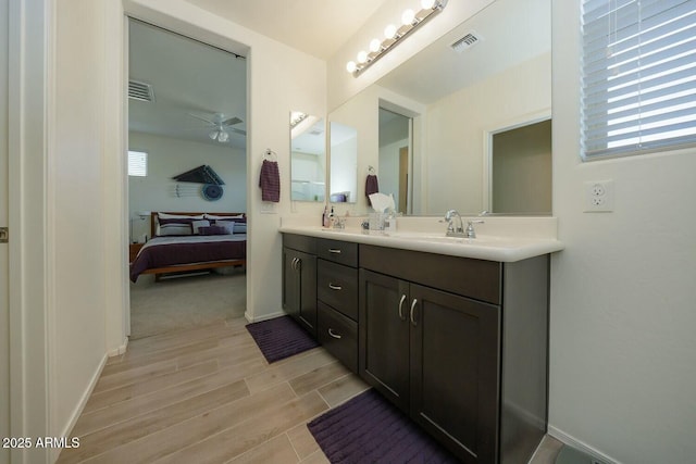 bathroom with vanity and ceiling fan