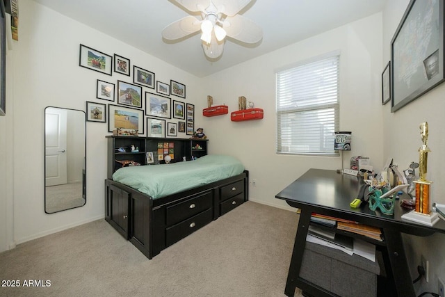 carpeted bedroom with ceiling fan