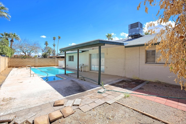 8326 E Valley View Rd, Scottsdale, AZ 85250 - view of swimming pool with central air condition unit, a fenced backyard, and a patio