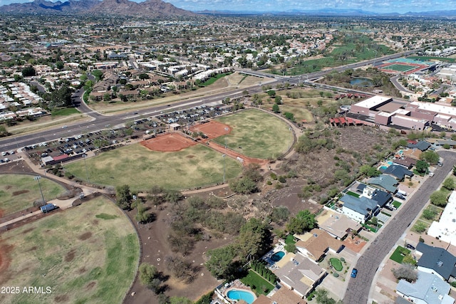 8326 E Valley View Rd, Scottsdale, AZ 85250 - aerial view of property and surrounding area featuring a mountainous background and nearby suburban area