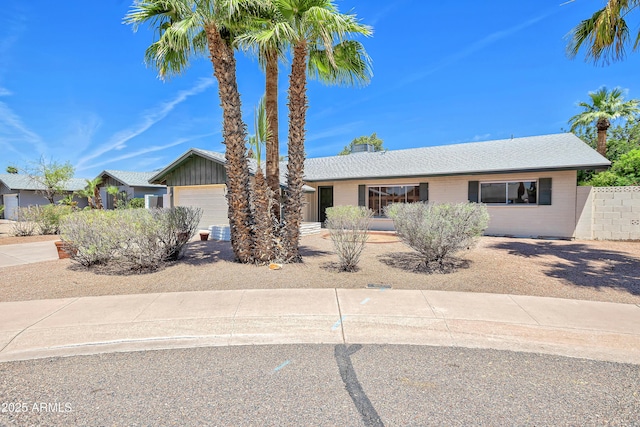 8326 E Valley View Rd, Scottsdale, AZ 85250 - ranch-style house featuring a garage and a chimney