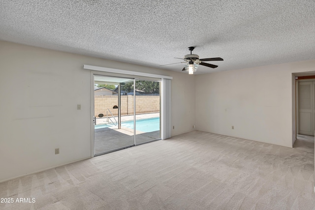 8326 E Valley View Rd, Scottsdale, AZ 85250 - spare room featuring light colored carpet, ceiling fan, and a textured ceiling