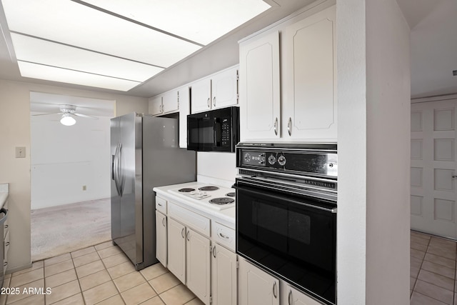8326 E Valley View Rd, Scottsdale, AZ 85250 - kitchen featuring black appliances, white cabinets, light tile patterned floors, and light countertops