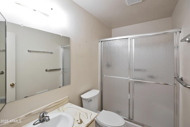 8326 E Valley View Rd, Scottsdale, AZ 85250 - full bathroom with a shower with shower door, vanity, and toilet