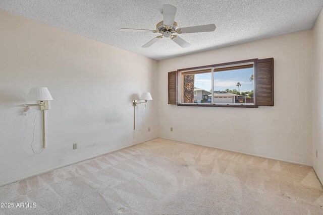 8326 E Valley View Rd, Scottsdale, AZ 85250 - spare room with carpet flooring, a textured ceiling, and a ceiling fan