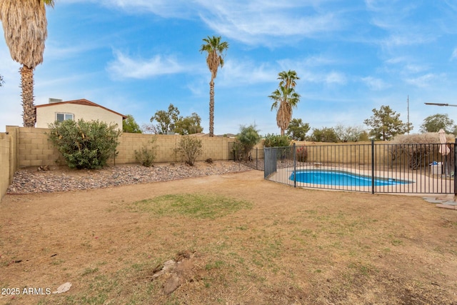 view of yard with a fenced backyard and a fenced in pool