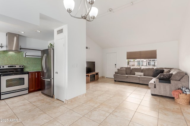 living room with a chandelier, high vaulted ceiling, light tile patterned flooring, and visible vents