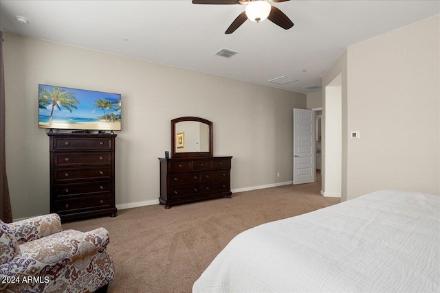 bedroom with light colored carpet and ceiling fan