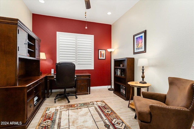 office space with light hardwood / wood-style flooring and ceiling fan