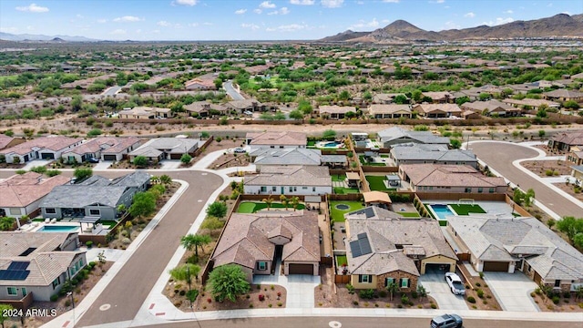 bird's eye view with a mountain view