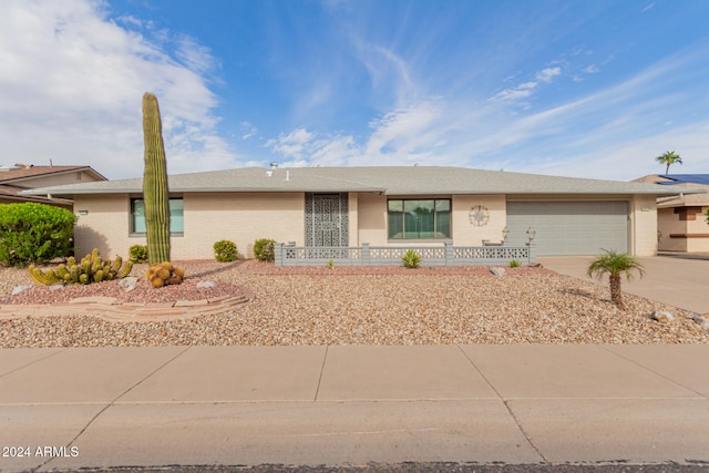 ranch-style home with a garage