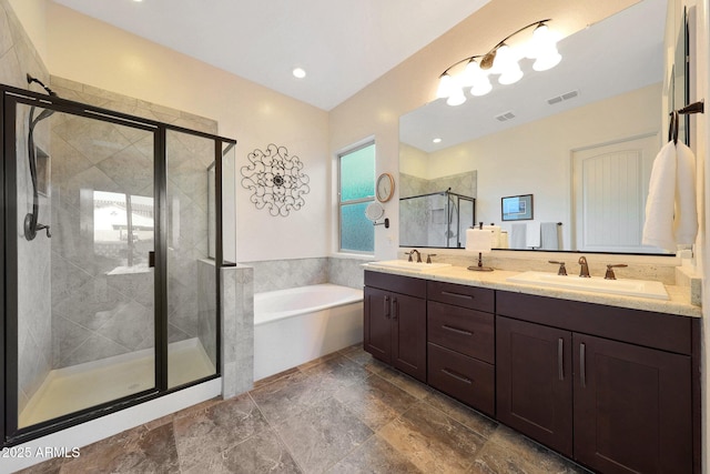 full bath featuring double vanity, a stall shower, visible vents, a sink, and a bath