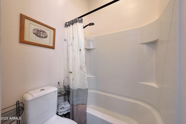 bathroom featuring shower / bathtub combination with curtain and toilet