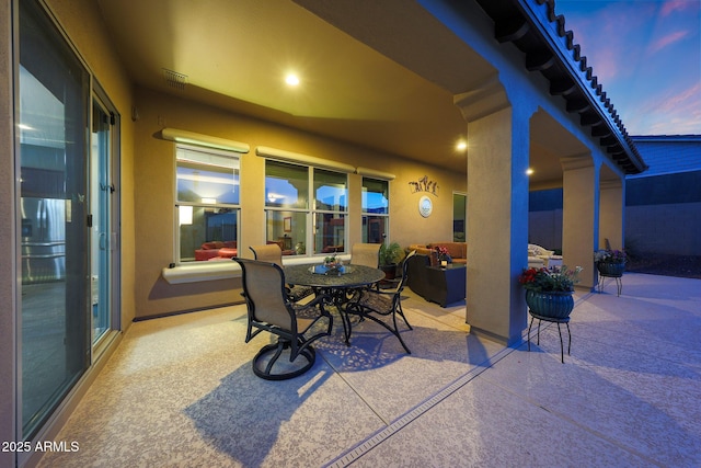 view of patio / terrace featuring visible vents and outdoor dining space