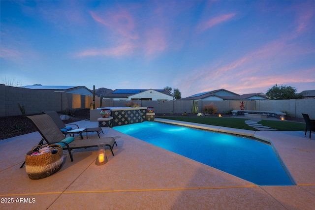 view of swimming pool featuring a fenced backyard, a jacuzzi, a fenced in pool, and a patio