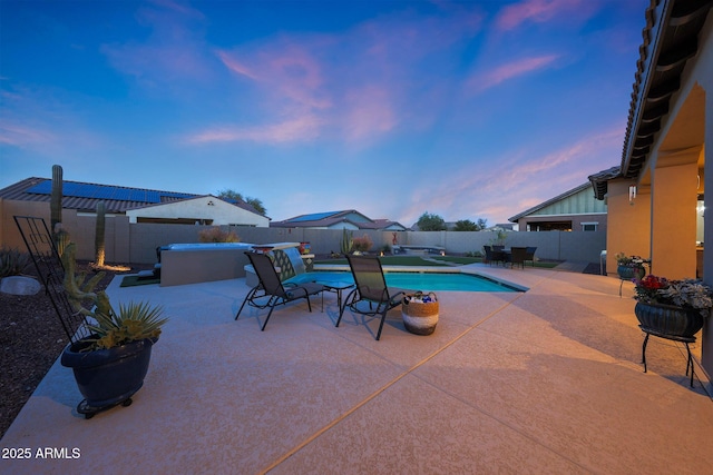 view of pool featuring a fenced in pool, a fenced backyard, and a patio