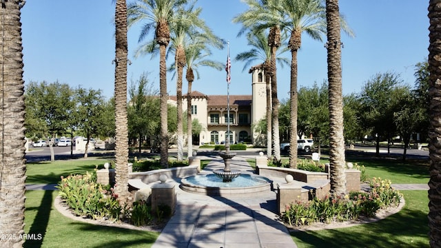 view of home's community featuring a lawn