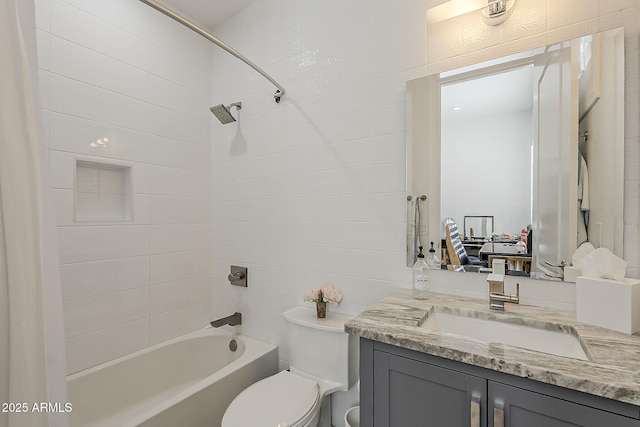 full bathroom featuring shower / bath combination with curtain, vanity, and toilet