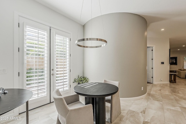 dining area with recessed lighting