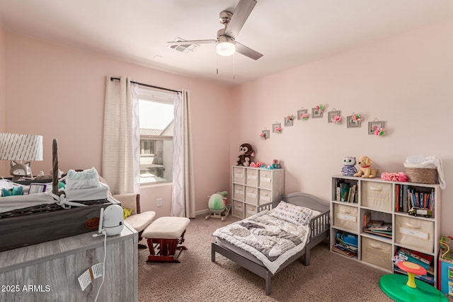 bedroom featuring visible vents, baseboards, a ceiling fan, and carpet