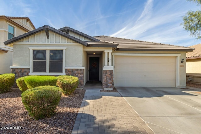 view of front of property featuring a garage