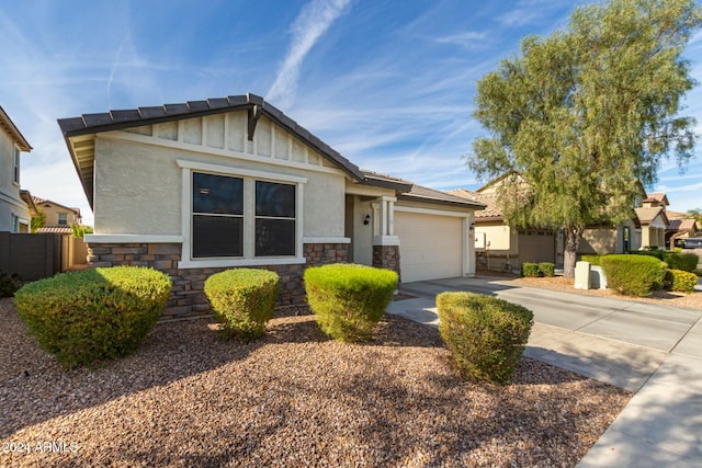 view of front of home with a garage