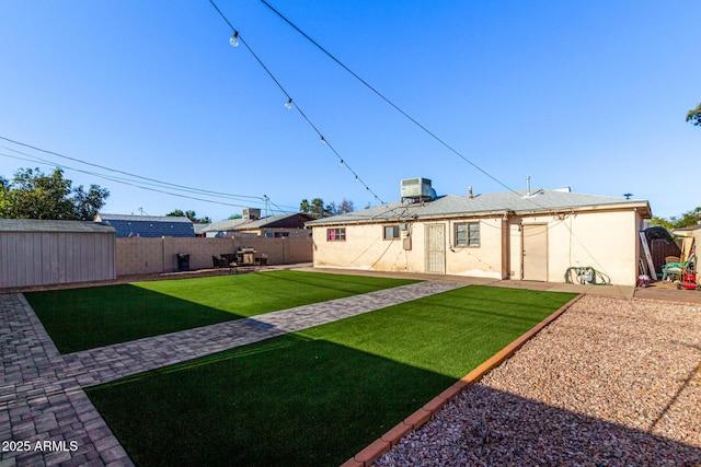 4408 N 29th Ave, Phoenix, AZ 85017 - rear view of property with a patio, stucco siding, and cooling unit