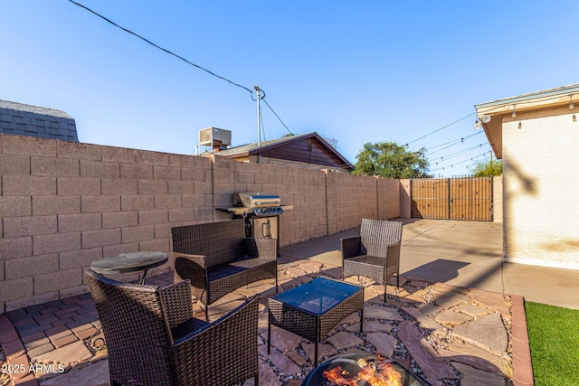 4408 N 29th Ave, Phoenix, AZ 85017 - fenced backyard with a patio area and outdoor lounge area