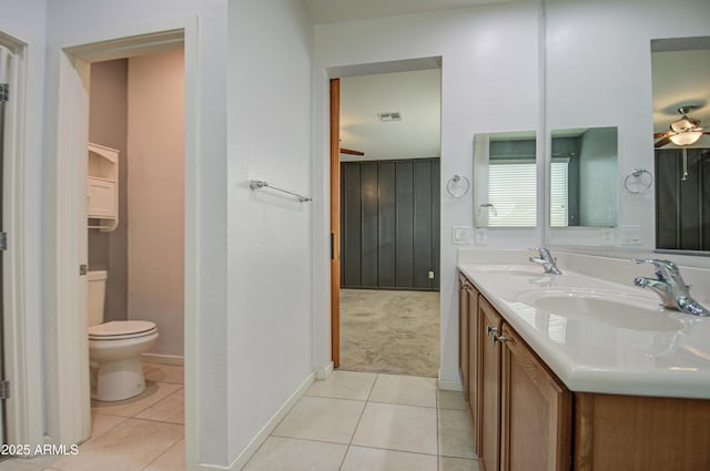 full bath with visible vents, a sink, and tile patterned floors