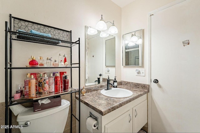 half bath with toilet and vanity