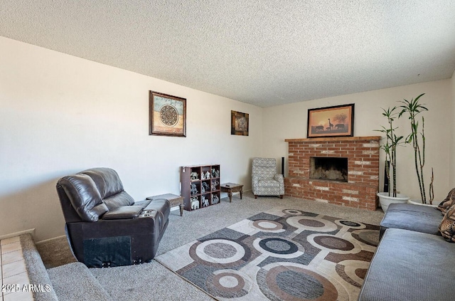 carpeted living area with a brick fireplace and a textured ceiling