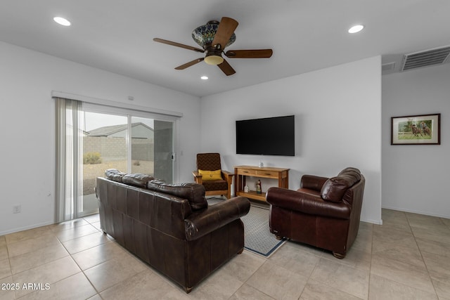 living area featuring light tile patterned floors, baseboards, visible vents, recessed lighting, and ceiling fan