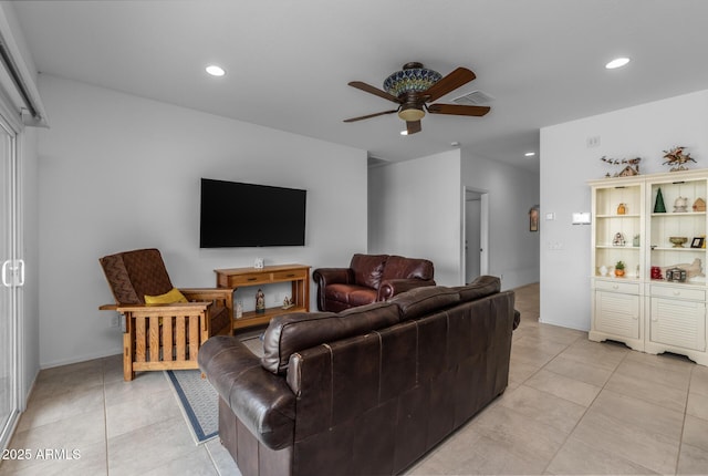 living area featuring recessed lighting, visible vents, a ceiling fan, and light tile patterned floors