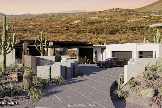 exterior space with fence and a mountain view