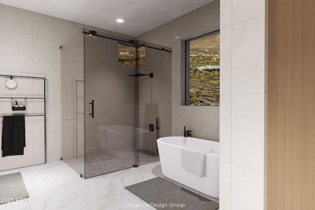 full bathroom with marble finish floor, a soaking tub, a shower stall, and tile walls